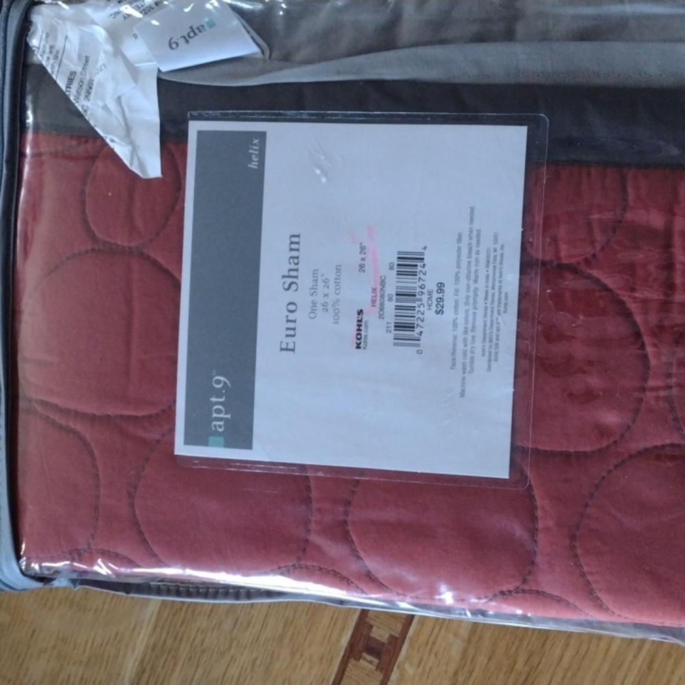 New Eurosham in brick color with dark grey border.100%cotton, 100% poly fill.